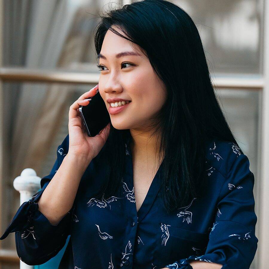 Asian woman on phone