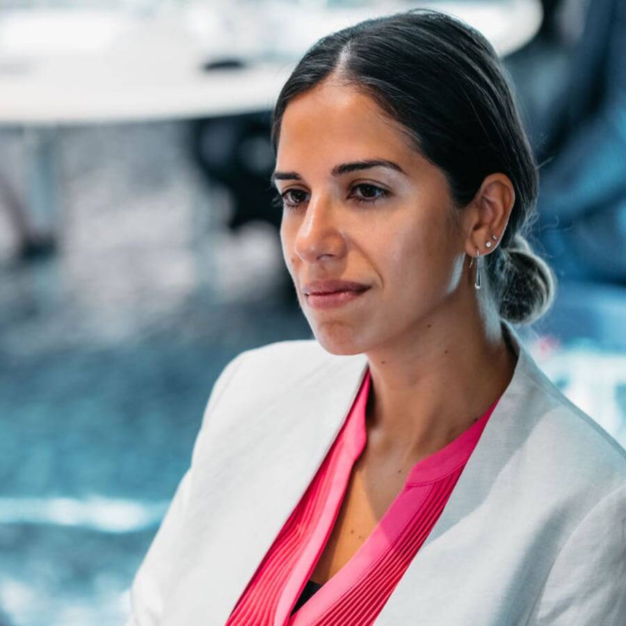 Woman White Jacket Looking Pensive