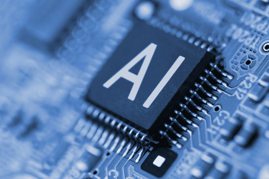 close-up of a computer chip with AI sign