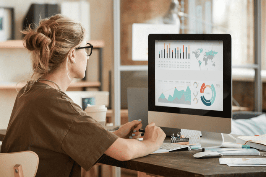 HR specialist processing payroll using GoGlobal's BlueOcean platform.